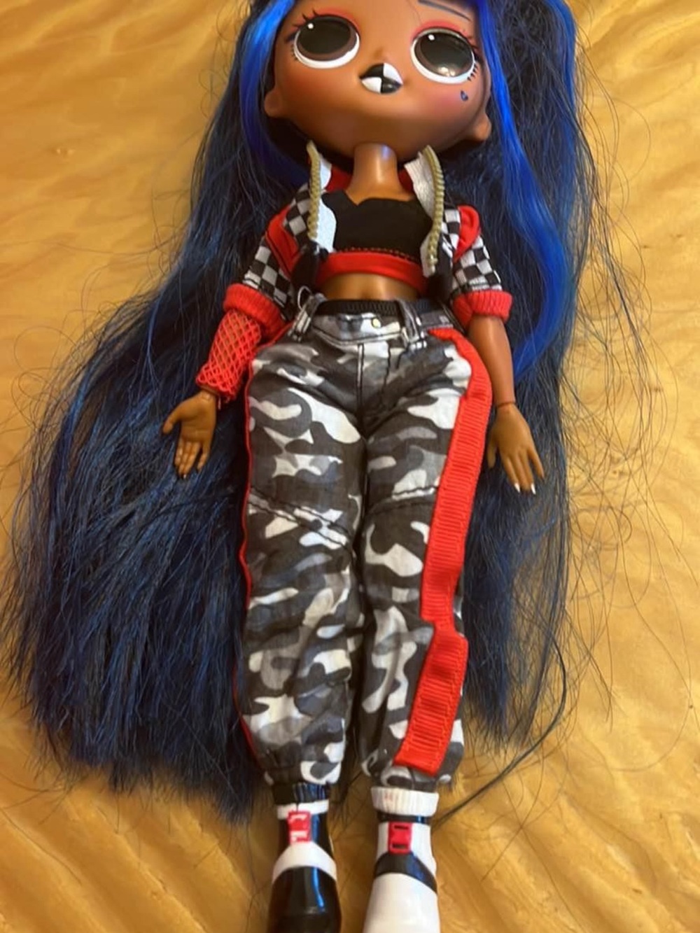 L.O.L. Surprise! Doll with Blue Hair, Red Accents, Black & White Camo Pants